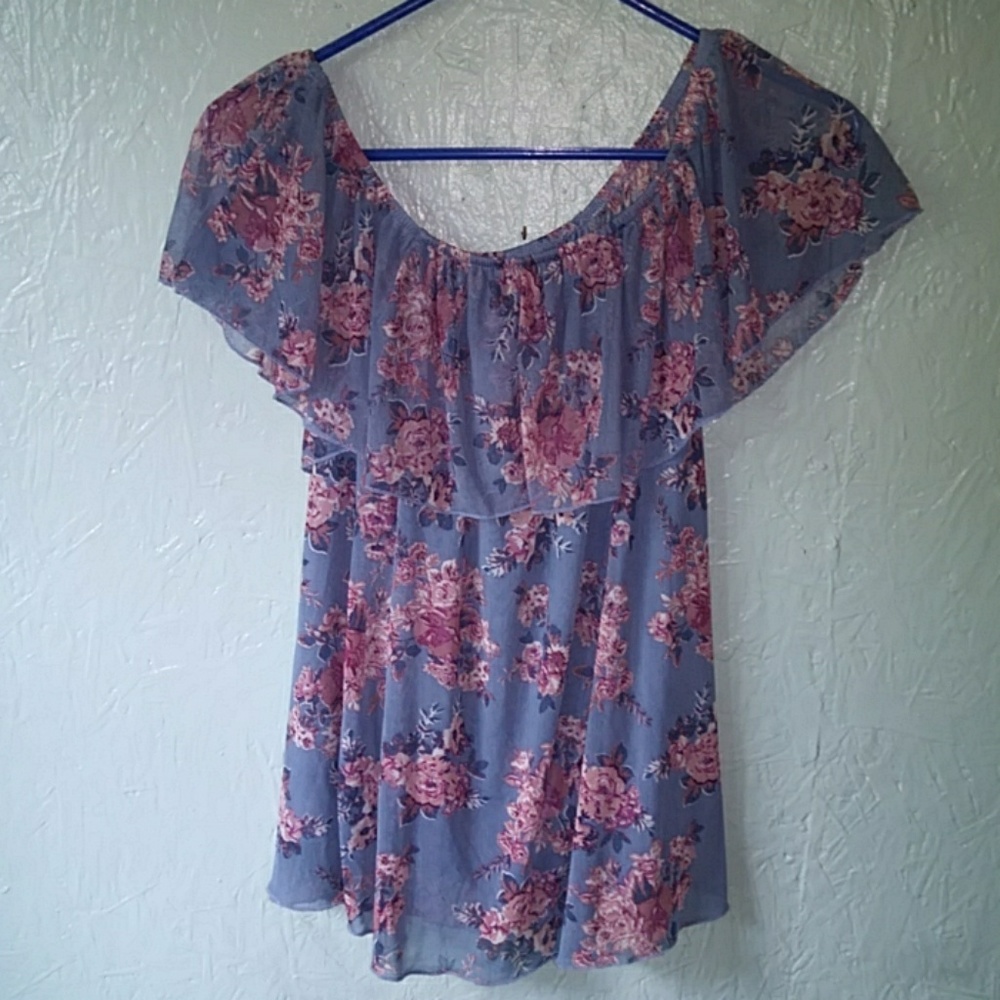 A blue off the shoulder blouse